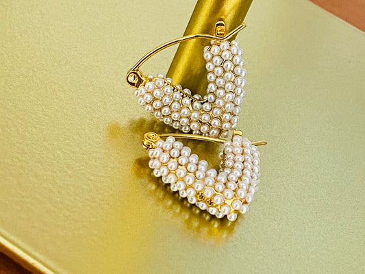 Argollas corazones perlados